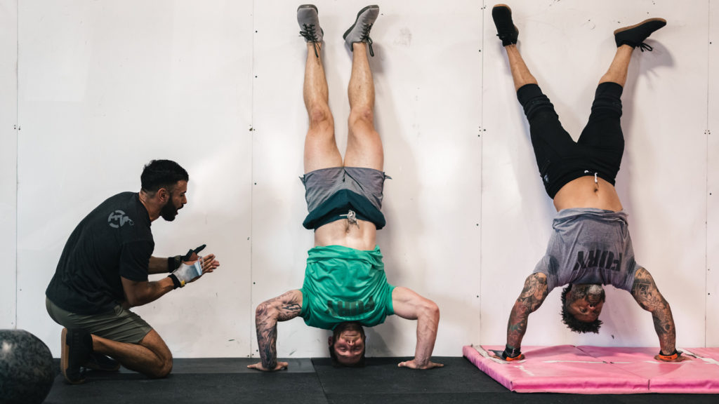 Kipping Handstand Push-up » Workout Planner