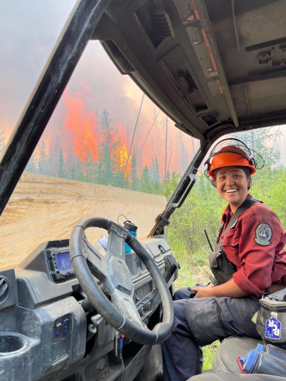 Devyn Gale smiling on-scene at a fire