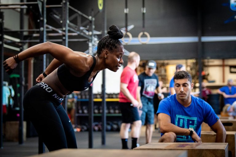 CrossFit athlete doing a box jump