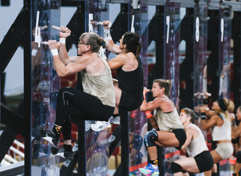 image of athlete climbing a peg board