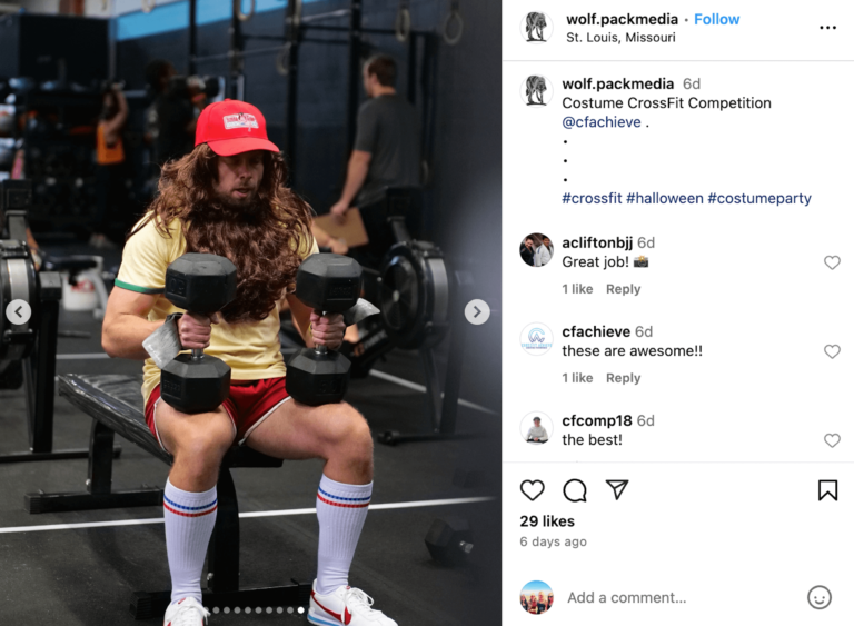 Athlete holding dumbbells in a Halloween Costume