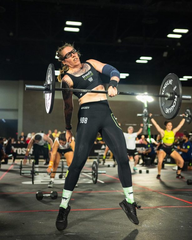 Abi Wynn-Jones at the 2024 Adaptive CrossFit Games snatching a barbell